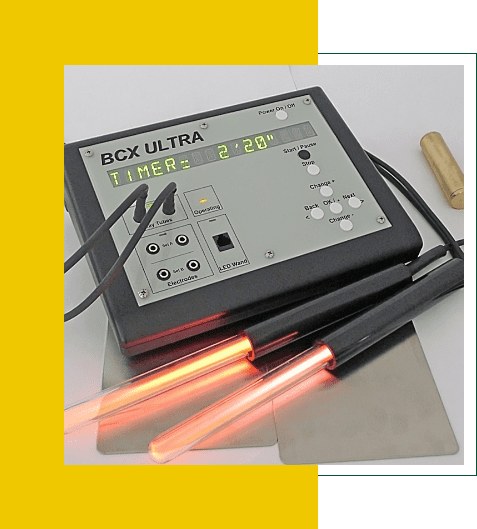 A BCK Ultra 4D laser device with glowing red light tubes.