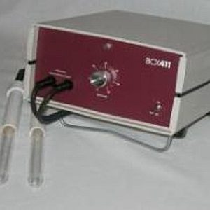 A compact laboratory device with two probes and a control knob.