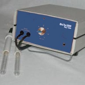 A blue and white medical device with attached probes or sensors.